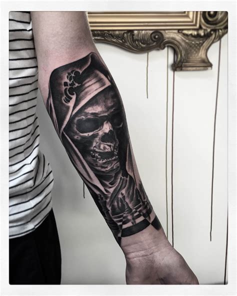 forearm black and grey tattoos